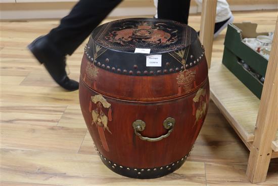 A Chinese red and black lacquer barrel shaped container